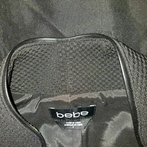 Black and gold bebe vest